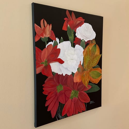 Painting of a red, orange and white flower arrangement