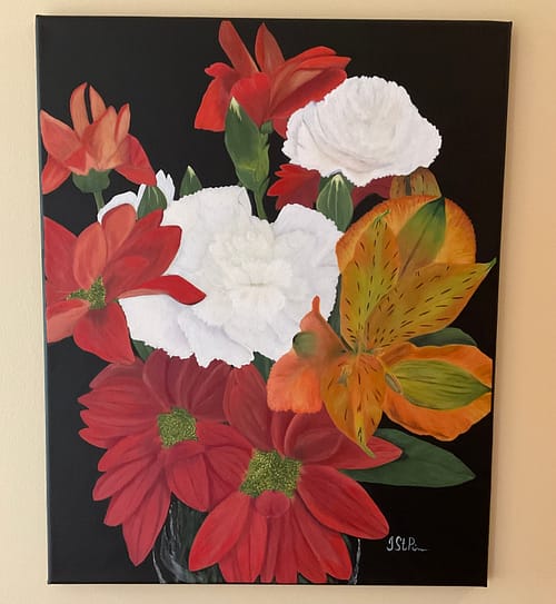 Painting of a red, orange and white flower arrangement