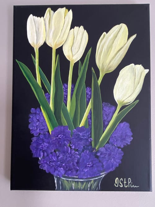 A painting of white tulips set into a glass vase of purple blooms