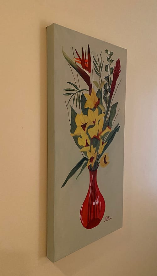 A painting of yellow and red flowers standing in a red glass vase